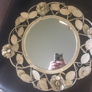 Decorative floral mirror.